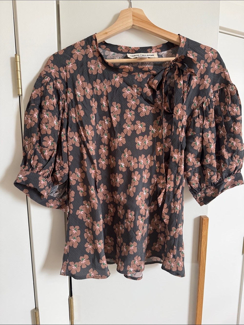 Caron Callahan Black Blouse with Pink Floral Tie Accent